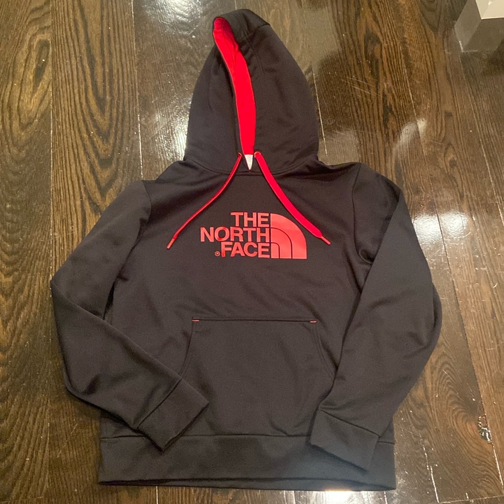 Men’s black North Face hoodie.